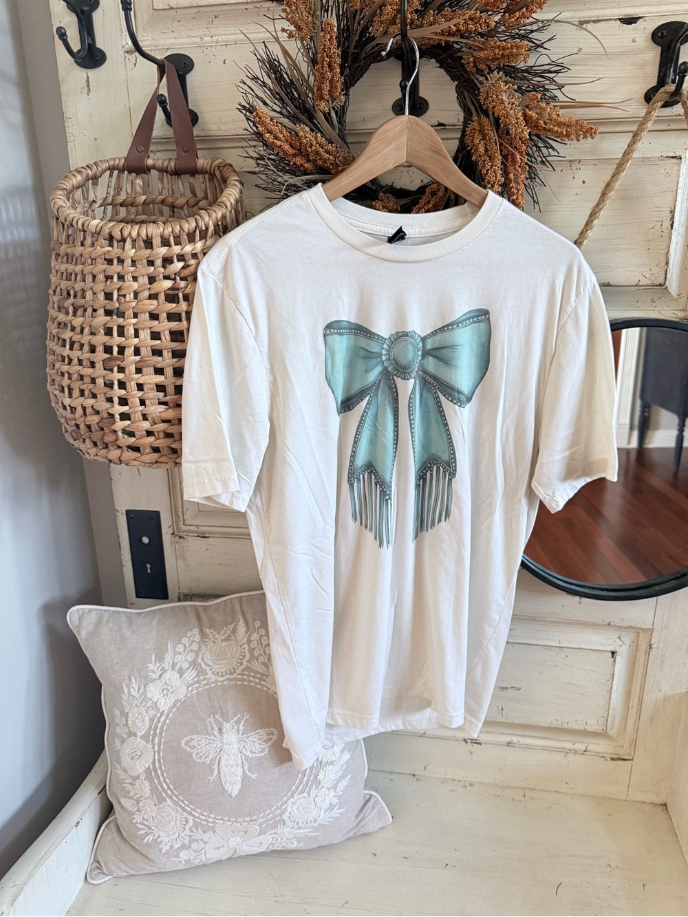 District White Tee with Teal Bow Graphic